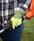 Person wearing Heavy Duty Industrial Work Gloves With ANSI Cut Level A5 Protection using a gardening tool.