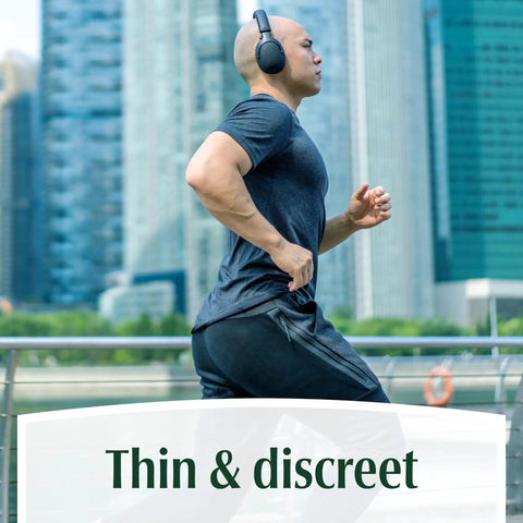 Man jogging in grey with headphones, displaying Fresh Protection Maximum Absorbency Incontinence Underwear For Men, Large, 35-43 inches.