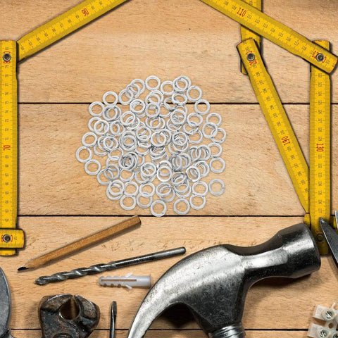 100 Pcs M8 Split Lock Spring Washers Made From 304 Stainless Steel for Screws and Fasteners with tools on wooden background