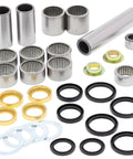Pro Grade Swing Arm Linkage Bearing Kit For Yamaha YZ125 2005 2007 Complete Replacement With 6 Bushings 9 Needle Bearings 4 Needle Bearing Shafts 8 Seals And 4 Washers For Smooth Handling And Maximum Durability, bearing kit parts laid out