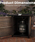 Outdoor Gas Fire Pit Table With 28 Inch Rattan Square Design Glass Wind Guard Tempered Glass Top Lid CSA Listed 50000 BTU Brown For Patio Deck And Garden showing open cabinet with propane tank not included, surrounded by plants