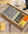 Expandable Bamboo K Cup Holder For Drawer Or Countertop Coffee Pod Storage Organizer filled with coffee pods and tea bags.