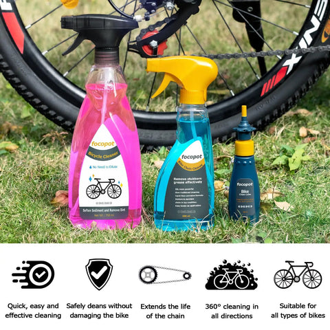 Bike Chain Cleaner Kit With Bicycle Cleaner Degreaser Lubricant And 12 Piece Cleaning Set displayed on grass next to bike wheel