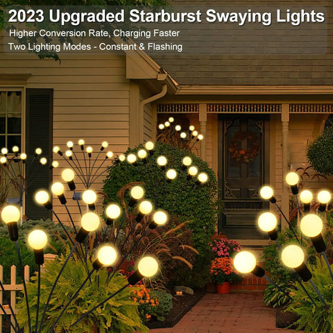 Upgraded Solar Firefly Lights 4 Pack Outdoor Waterproof 8 LED Starburst Swaying Lights decorating house pathway at dusk