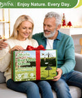 Couple holding a gift box of 94 Inch Garden Bird Feeding Station Kit With Heavy Duty Metal Squirrel Baffle Seed Tray And Mesh Basket