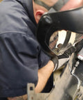 Worker using Beast Power Air Die Grinder with 25,000 RPM and 0.4 HP, 1/4 inch collet for metal grinding with ergonomic grip.