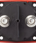 Red square battery isolator switch with black base and two 10mm terminals labeled INPUT and OUTPUT