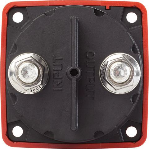 Red square battery isolator switch with black base and two 10mm terminals labeled INPUT and OUTPUT