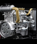 Boss Mini Diesel Engine Model Kit With Real Working OHV Four Cylinder Mechanism Slick Metal DIY Assembly Set Legit Educational Mechanical Engineering Toy For Gearheads And Makers 300 Pieces detailed engine view with metallic components and pipes.