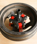 Harmonic Balancer Puller Kit For Cars And Trucks With Adjustable 3-Jaw Design in use, removing damper from engine pulley