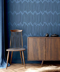 DIY Friendly Ink Lines Geometric Wall Stencil Set 2 Pack 17x39 Inches for easy accent walls in a modern room with a chair and cabinet.