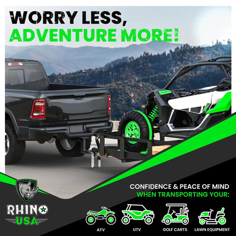 Heavy duty E Track ratchet tie down straps securing an ATV on a truck trailer, showcasing reliable locking power for tough hauling.
