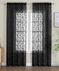 Black Sheer Curtains 90 Inch Long Two Panel Set displayed with a light filtering jacquard pattern, rod pocket design in a living room.