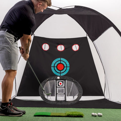 Man practicing swing with the Massive 10x7ft Golf Practice Net Kit With Hitting Net Chipping Net Tri Turf Mat And Target Mat