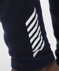 Close-up of Lifa Merino Midweight 2-In-1 Base Layer Pant For Cold Weather detail, Navy 598, Size Small.