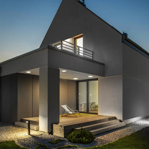 Modern house exterior illuminated with BR30 Smart Flood Light Bulb With 2.4GHz WiFi RGBW Color Changing And Dimmable Lighting