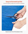 Heavy Duty Floor Underlayment Roll 3 Mm Thick Laminate Flooring Padding With Vapor Barrier being trimmed with scissors.
