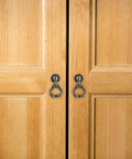Retro Zinc Alloy Pull Ring Cabinet Handles 4 Pack For Cabinets And Cupboards on wooden door, 59mm, vintage design.