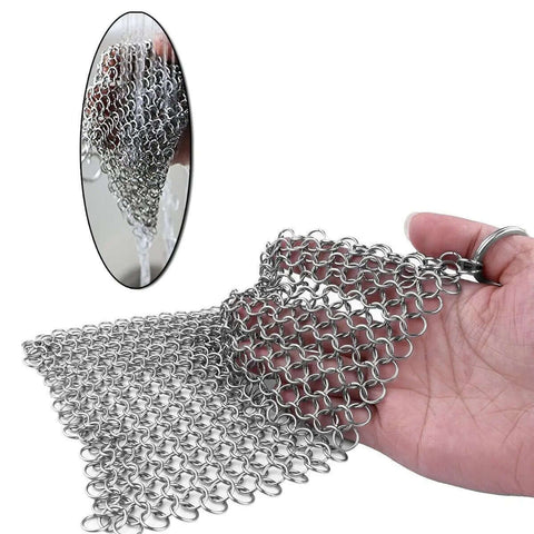 Close-up of Cast Iron Scrubber With Stainless Steel Chainmail, 8x6 Inch Skillet Cleaner For Preseasoned Pans, in a hand.
