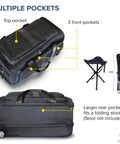 Black and gray dance competition travel bag with multiple pockets and rolling wheels, featuring a large rear pocket for a stool.