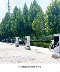 Heavy Duty EV Fast Charger With Kickin DC Fast Charging System and Rugged Steel Cabinet at installation site amidst trees.