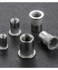 Twenty Pieces 304 Stainless Steel Flat Head Threaded Inserts With Knurled Body For Heavy Duty Metal Work and Punched Hole Strength Installation That Holds Tight, assorted sizes.