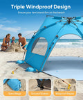 Pop Up Beach Tent Sun Shelter For 3 To 4 People with windproof design at a beach.