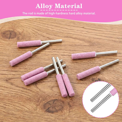 Diamond Chainsaw Sharpener Kit 32 Pieces Pink Sharpeners With 0.22 Inch Heads Pro Grade Diamond Burrs shown on wooden surface
