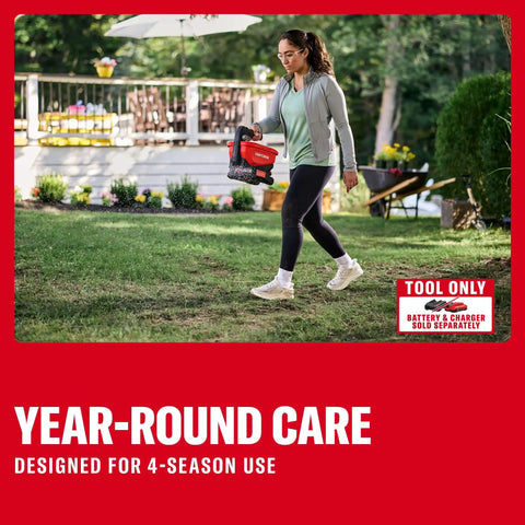 V20 Four Season Seed Spreader Handheld One Point Two Gal With 6 Speed Settings for Fertilizer Salt and Ice Melt Crazy Coverage Up To 5000 Sq Ft Per Tub Tool Only Easy Grip Versatile Spreading For Your Yard And Garden in use for lawn care.