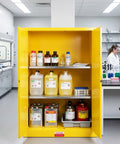 Pro Grade 90 Gallon Flammable Safety Cabinet Built Tough As Nails With Double Manual Doors For Industrial Shops OSHA Certified Flammable Liquid Storage Locker In Bright Yellow containing hazardous liquids.