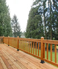 Wooden deck with railing using Heavy Duty 4 Pack Wood Post Brackets With Inner Size 3.58 By 3.58 Inches Powder Coated Matte Black.