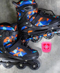 Pair of colorful inline skates with Universal Skate Brake Block For Roller Skates And Inline Pads next to them on concrete surface.