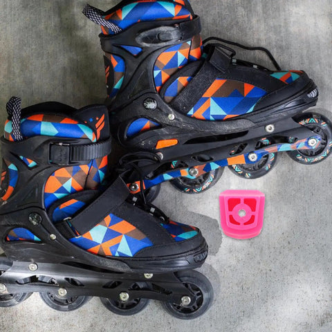Pair of colorful inline skates with Universal Skate Brake Block For Roller Skates And Inline Pads next to them on concrete surface.