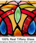 Close-up of Tiffany Style Stained Glass Pendant Light, intricate cream brown Victorian pattern with vibrant colors.