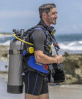 Man wearing Glide Front Adjustable Scuba BCD With Balanced Power Inflator For Recreational Diving All Day Comfort With Y Fit Shoulders