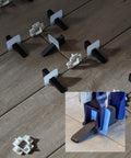 One Eighth Inch Tile Leveling System With 500 Clips For Lippage Free Tile And Stone Installations, showing clips in use on floor tiles