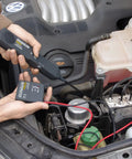 Hands using Automotive Wire Tracker Pro with Short and Open Circuit Finder and Cable Toner for DC 6 to 42V in car engine