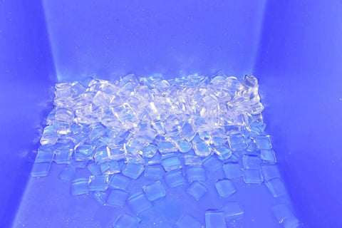Heavy Duty Commercial Ice Maker Kicks Out 1980 Lbs Of Rock Solid Square Cubes Daily showing clear ice cubes in a blue hopper.