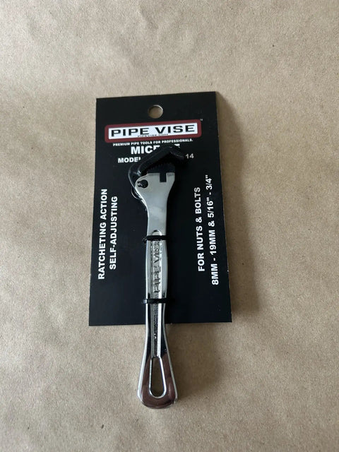 Heavy Duty 6 Inch Self Adjusting Pipe Vise With Slick Chrome Finish And Comfort Contoured Handle For Tight Workspaces on display.