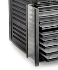 Close-up of Super Durable 10 Tray Electric Food Dehydrator Featuring Smart Digital Interface and Quick Dual Drying Zones loading trays.