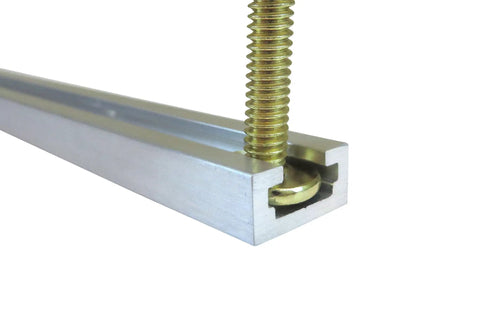 Close-up of Set Of Four Premium Aluminum T Slot Track Rails Twenty Four Inches Long With A Deep Three Eighth Inch Channel.