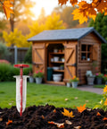 Compact Handheld Seed Spreader For Precise Sowing In Lawns, Gardens And Planters, tool on soil with autumn backdrop