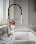 Slick Stainless Steel Kitchen Sink Faucet With Built In Soap Dispenser And Heavy Duty Pull Down Sprayer showing modern design and pull-down sprayer.