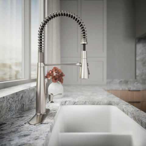 Slick Stainless Steel Kitchen Sink Faucet With Built In Soap Dispenser And Heavy Duty Pull Down Sprayer showing modern design and pull-down sprayer.