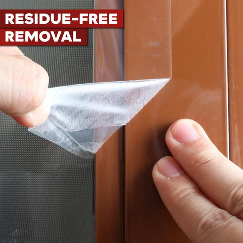 Person peeling Transparent Window Weather Stripping Tape 2 Inch By 30 Yard Pack Three No Residue Insulation Seal for a door.