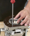 Dead On Accuracy 30mm Router Guide Bush Spigot For Jig And Template Routing Designs, metal guide being mounted on router.