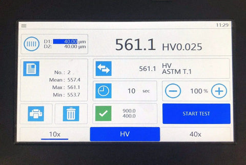 Micro Digital Vickers Hardness Tester With Touch Screen and Automatic Measurement displaying hardness readings on LCD.