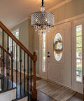Crystal Drum Chandelier With Bronze Finish Four Light Ceiling Fixture in vintage farmhouse style in a hallway setting.