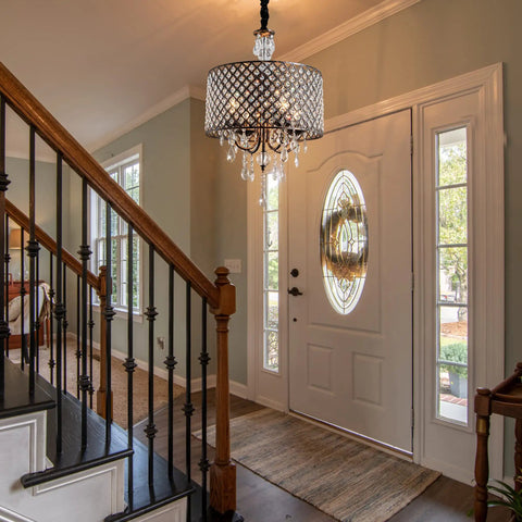 Crystal Drum Chandelier With Bronze Finish Four Light Ceiling Fixture in vintage farmhouse style in a hallway setting.