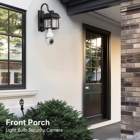 Front porch with light bulb security camera installed near door and window, surrounded by greenery.